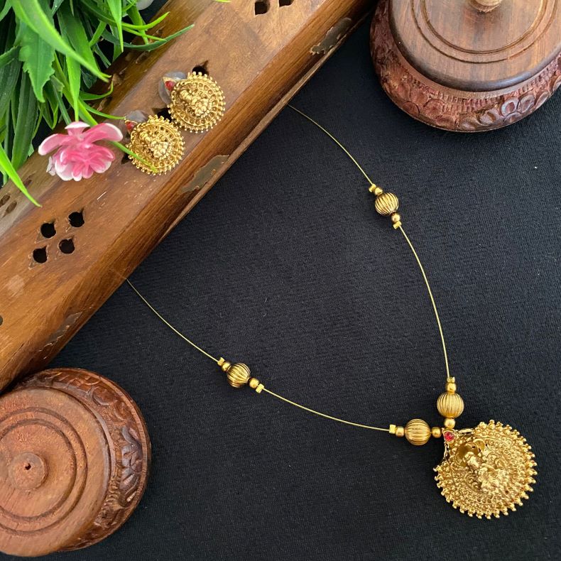 ANTIQUE GOLD INIVISIBLE LAKSHMI RUBY PENDANT CHAIN